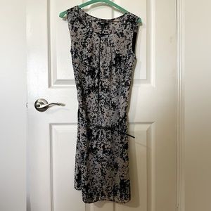 Pretty Mexx lined floral sleeveless and belted dress. Size 4.